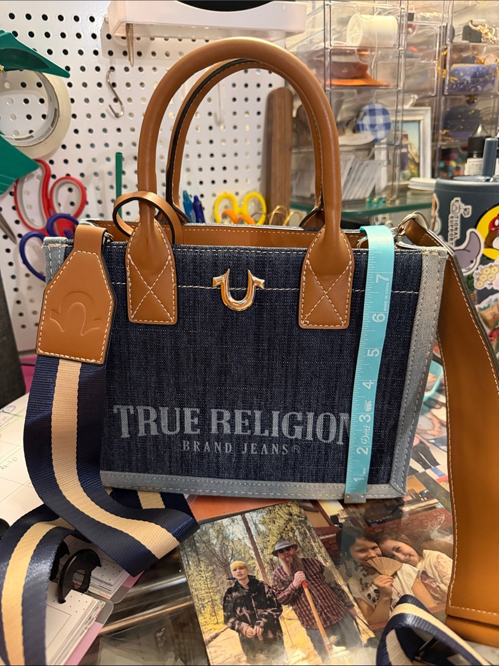 True Religion Navy Denim Satchel with Tan Leather Trim and Striped Strap